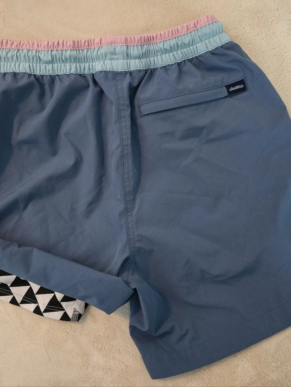 chubbies Blue Swim Trunks with Pink and Light Blue Waistband